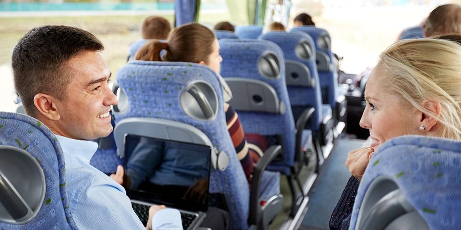 transport, tourism, road trip and people concept – group of happ